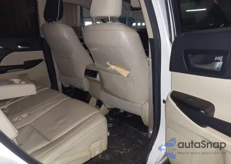 2015 Toyota Highlander Xle V6 z USA, uszkodzony, nr VIN 5TDJKRFH6FS124344